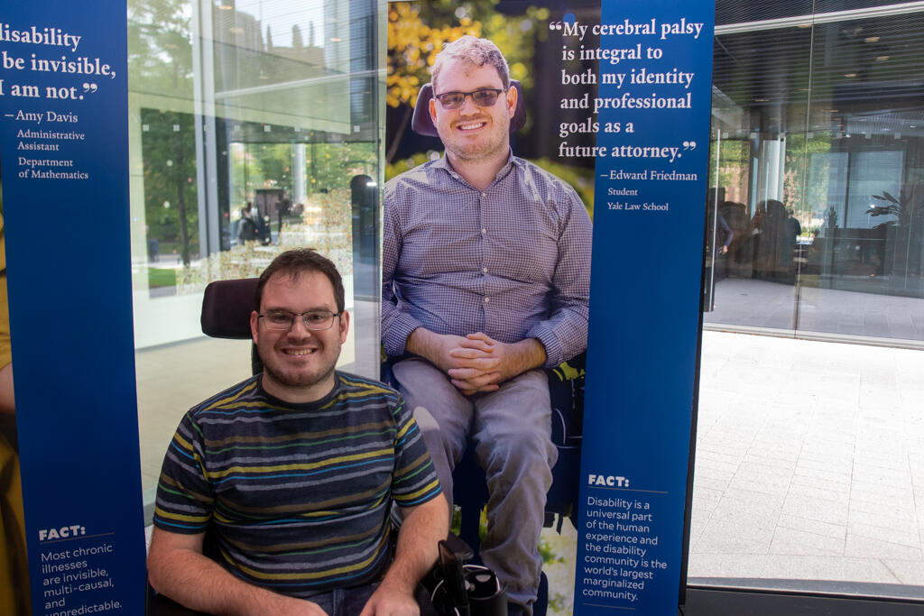  Yale Law Student Edward Friedman poses in front of his banner.